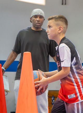 Learn about the benefits of attending a Mercadel Basketball youth camp.